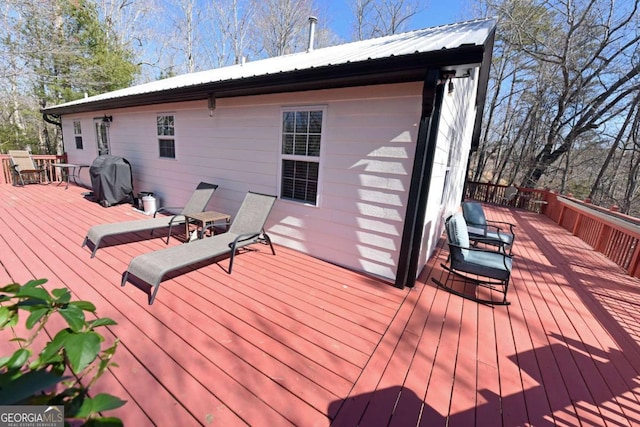 wooden deck with area for grilling