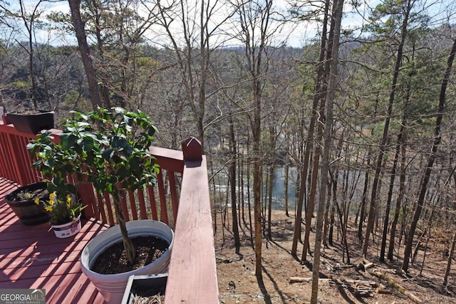 exterior space featuring a view of trees