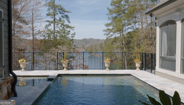 view of pool with fence and a fenced in pool
