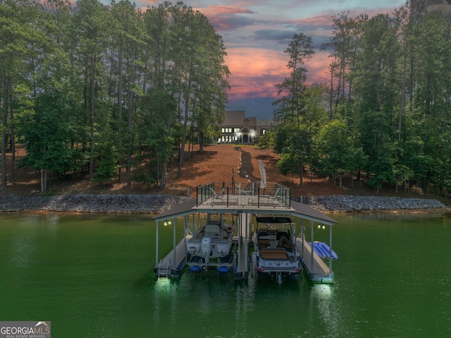 dock area featuring a water view and boat lift