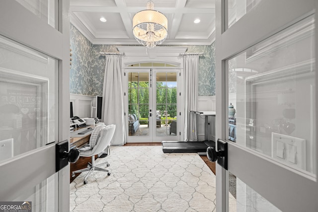 home office with coffered ceiling, french doors, a decorative wall, and ornamental molding
