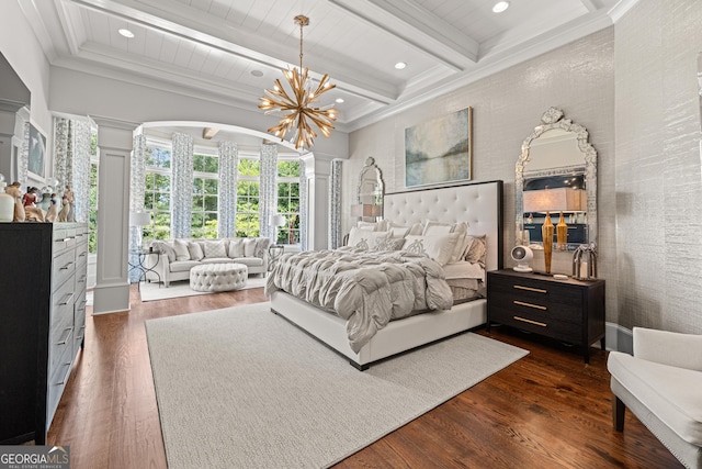 bedroom featuring recessed lighting, beam ceiling, a notable chandelier, ornate columns, and dark wood finished floors