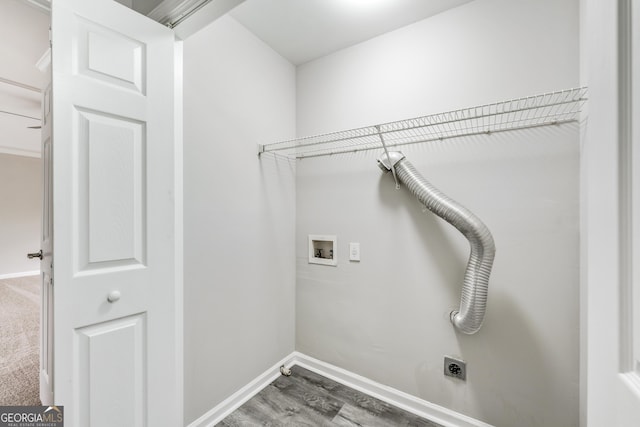 laundry area featuring electric dryer hookup, baseboards, washer hookup, and laundry area