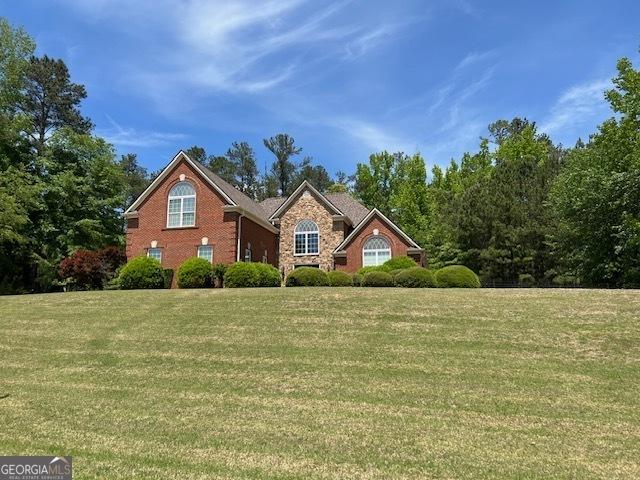 traditional home with a front lawn