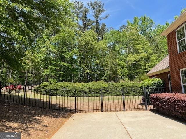 view of patio / terrace with fence