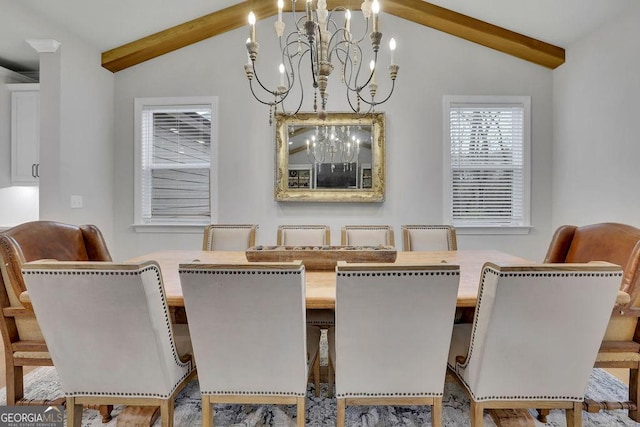 dining room with a chandelier and vaulted ceiling with beams