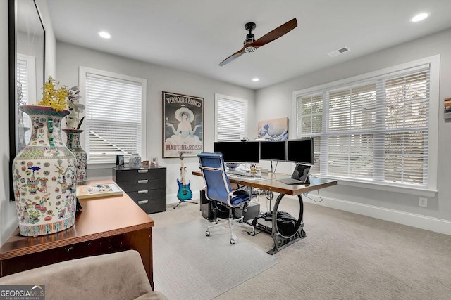 carpeted home office featuring recessed lighting, visible vents, baseboards, and a ceiling fan