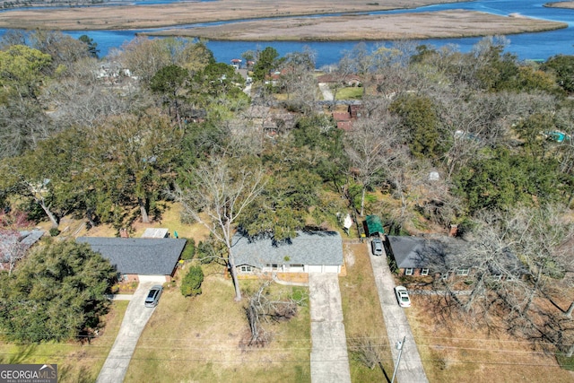 drone / aerial view with a water view