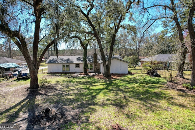 view of yard with fence