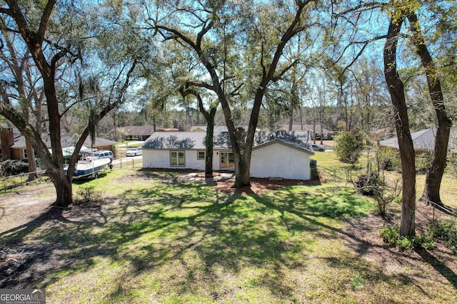 view of yard featuring fence