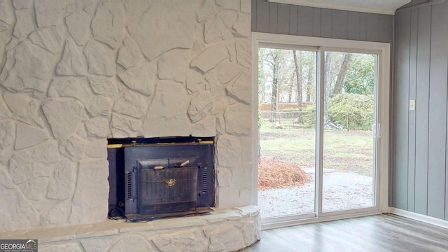 room details with a fireplace and wood finished floors