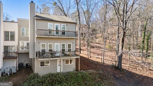 10 Colony Ridge Dr, Alpharetta, GA 30022 - rear view of property featuring a balcony and a chimney