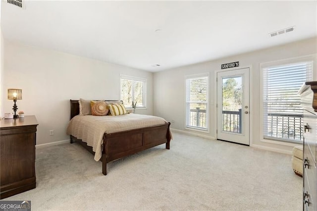 10 Colony Ridge Dr, Alpharetta, GA 30022 - bedroom featuring access to exterior and light colored carpet