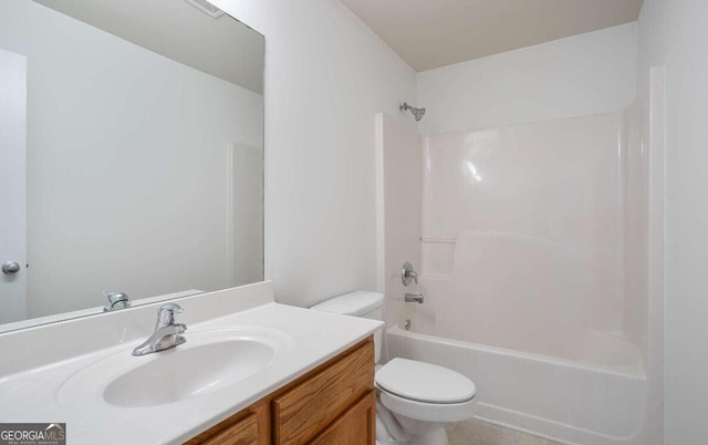 bathroom featuring toilet, shower / washtub combination, and vanity