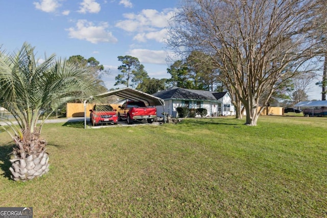 view of yard featuring a detached carport