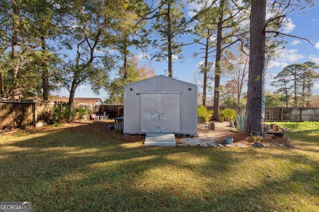 view of shed featuring a fenced backyard