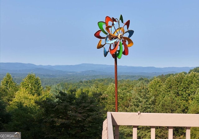 property view of mountains with a wooded view