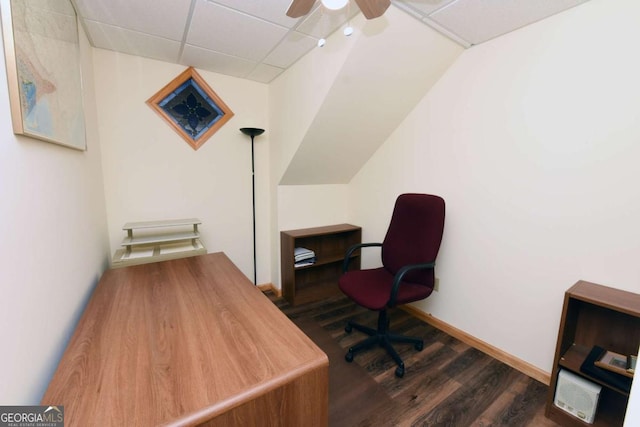 office space with baseboards, a paneled ceiling, and dark wood-style flooring