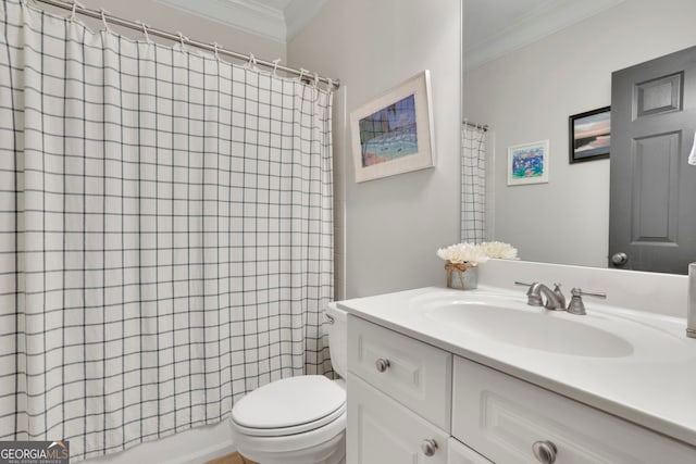 bathroom with vanity, toilet, shower / bath combo with shower curtain, and ornamental molding