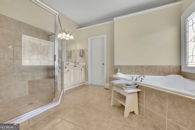 bathroom featuring ornamental molding, a tile shower, a bath, tile patterned floors, and vanity