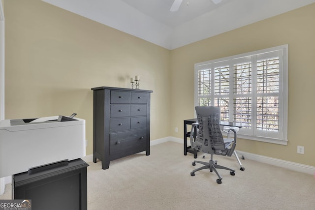 office area featuring a ceiling fan, carpet, and baseboards