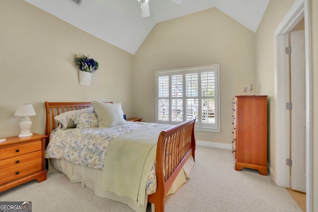 bedroom with baseboards, carpet floors, lofted ceiling, and ceiling fan