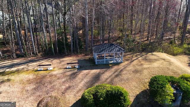 drone / aerial view with a view of trees