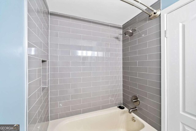 bathroom with shower / bathing tub combination