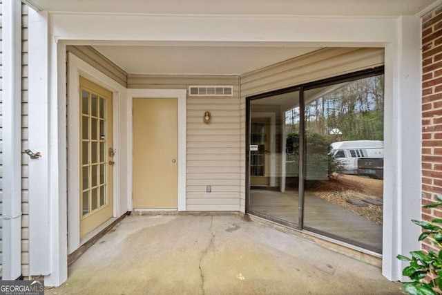 view of patio featuring visible vents