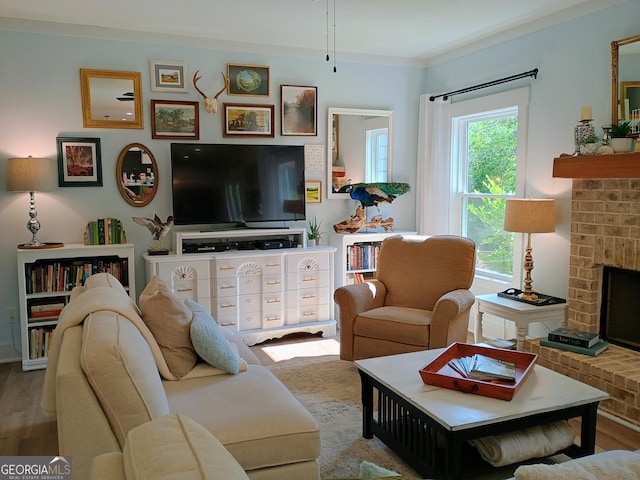 336 White Oak Way, Monroe, GA 30655 - living room featuring a fireplace, wood finished floors, and ornamental molding