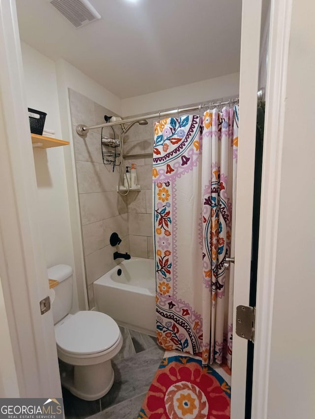 336 White Oak Way, Monroe, GA 30655 - bathroom featuring toilet and shower / tub combo with curtain