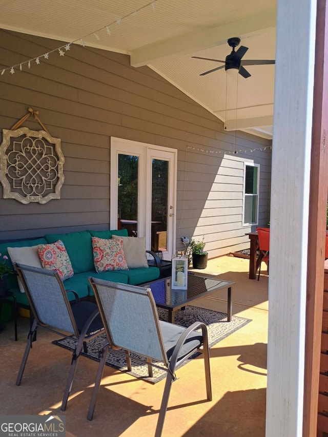 view of patio featuring an outdoor living space and ceiling fan