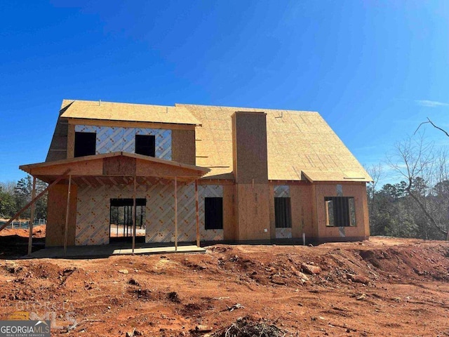 rear view of house featuring a patio area