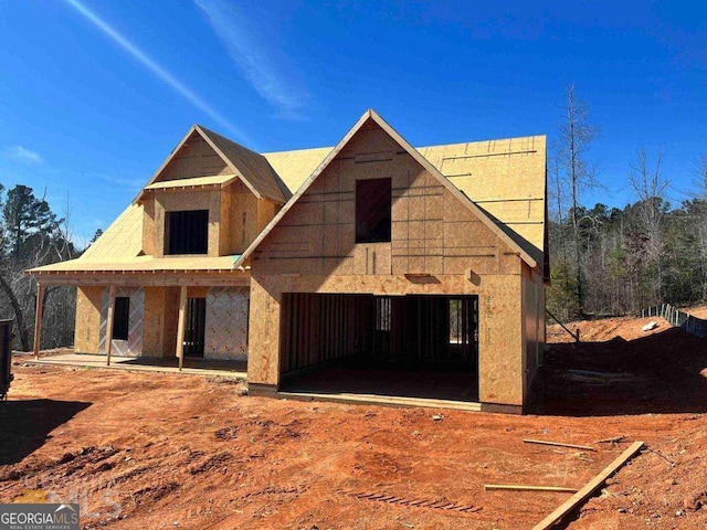 property under construction featuring a patio area