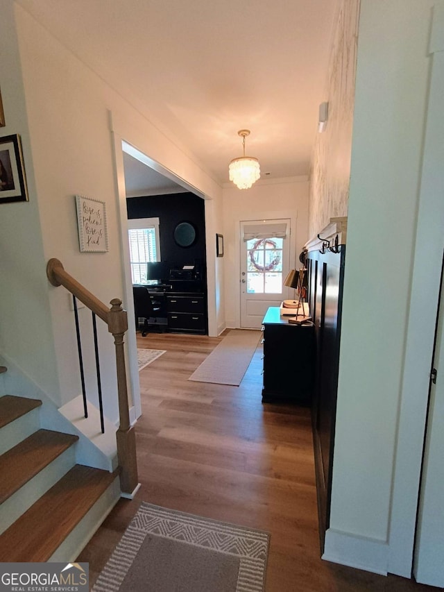 entryway with stairway and wood finished floors