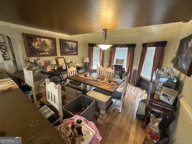 dining room with wood finished floors