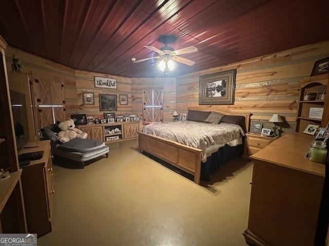 carpeted bedroom featuring wooden walls and wood ceiling