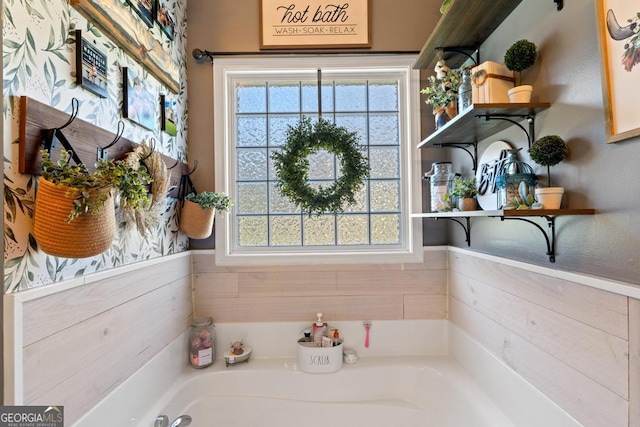 full bathroom with a garden tub