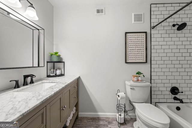 bathroom with visible vents, shower / bathtub combination, toilet, and vanity