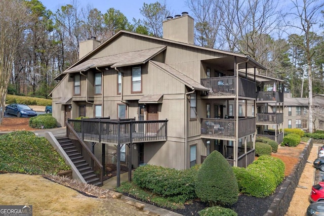 view of property with stairway