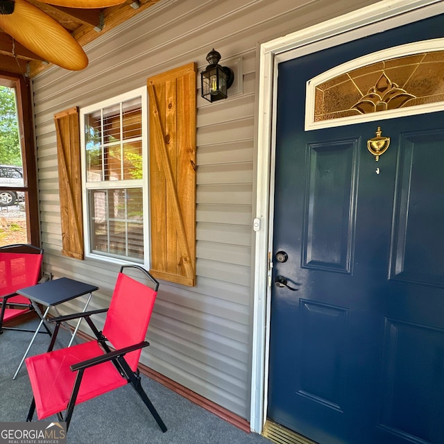 entrance to property with covered porch