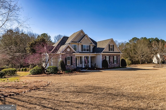 view of front of home with a front lawn