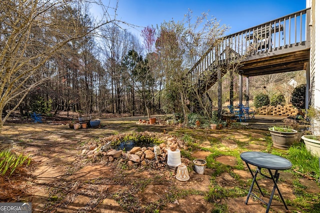 view of yard featuring a deck