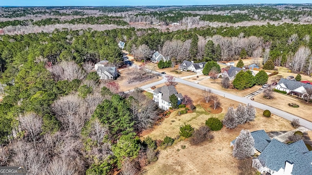 bird's eye view with a forest view