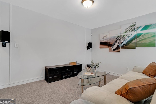 living room with baseboards and carpet flooring