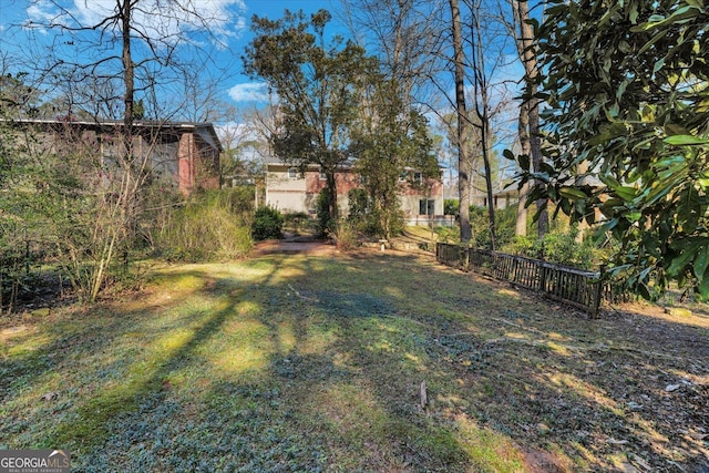 view of yard with fence