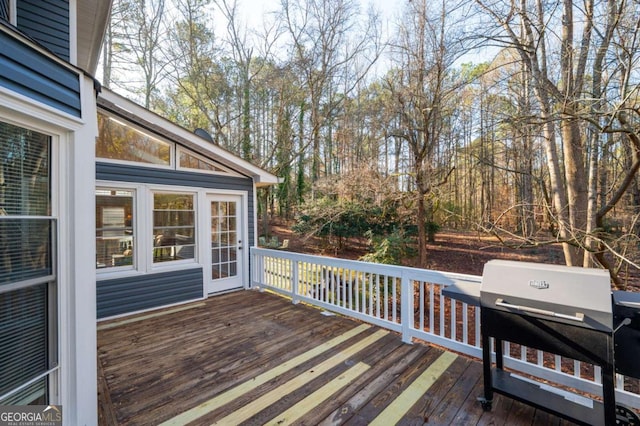 wooden terrace with grilling area