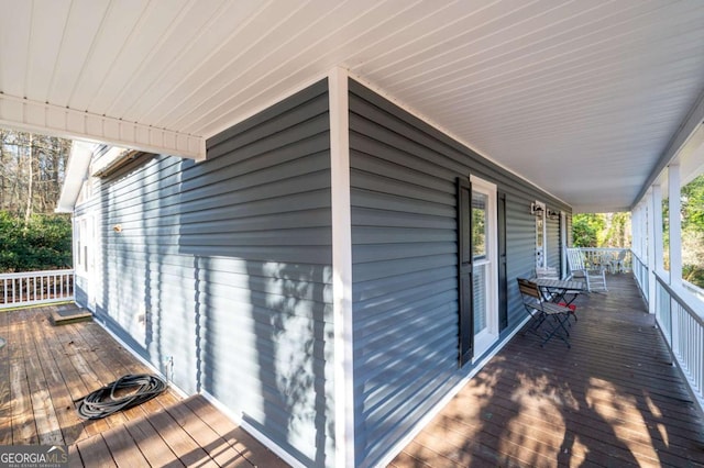 wooden deck featuring a porch