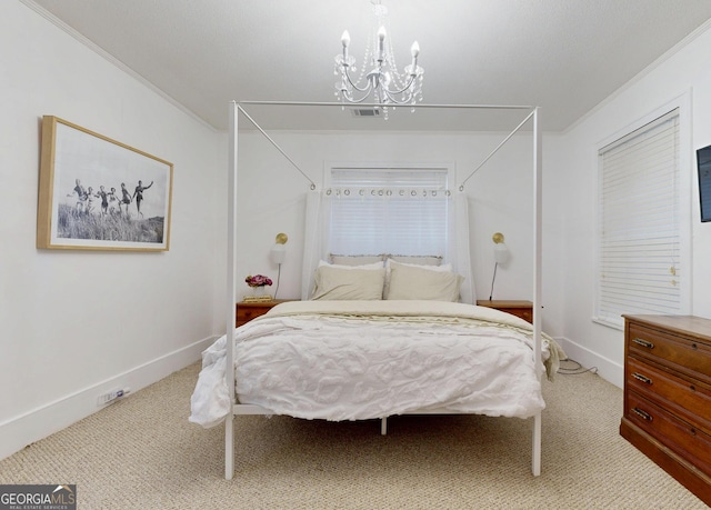 carpeted bedroom featuring baseboards, crown molding, a notable chandelier, and visible vents