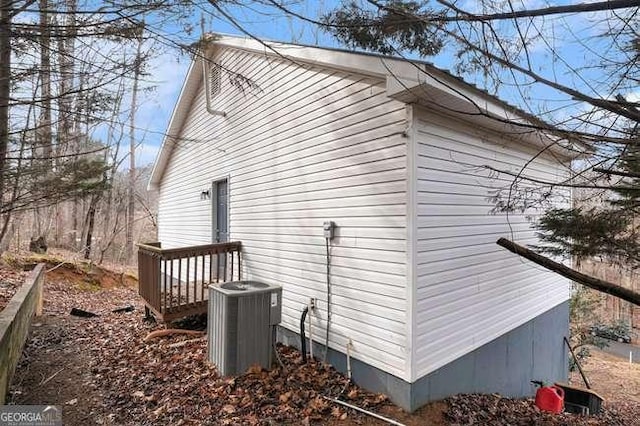 view of property exterior featuring central AC